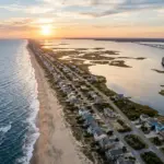 Aerial view of Outer Banks barrier islands and beach houses along the North Carolina coastline