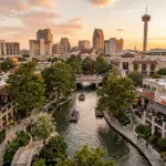 San Antonio River Walk and downtown skyline at golden hour representing the STR investment market