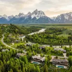 Aerial view of Jackson Hole Wyoming with Teton mountains showing summer STR market demand