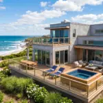 Modern beach vacation rental property with ocean view deck, representing how to buy an Airbnb property in 2026