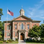 Saratoga County government building representing the new mandatory short-term rental registry and platform data-sharing law passed April 2026