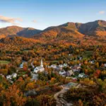 White Mountains New Hampshire fall foliage aerial view with ski resort visible
