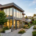 Mortgage office with residential properties in background representing STR financing options 2026