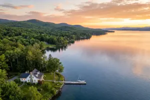 Lake Champlain waterfront vacation rental property at sunset Vermont shoreline
