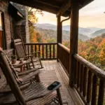Smoky Mountains cabin porch with rocking chairs and misty forest view representing remote short-term rental management